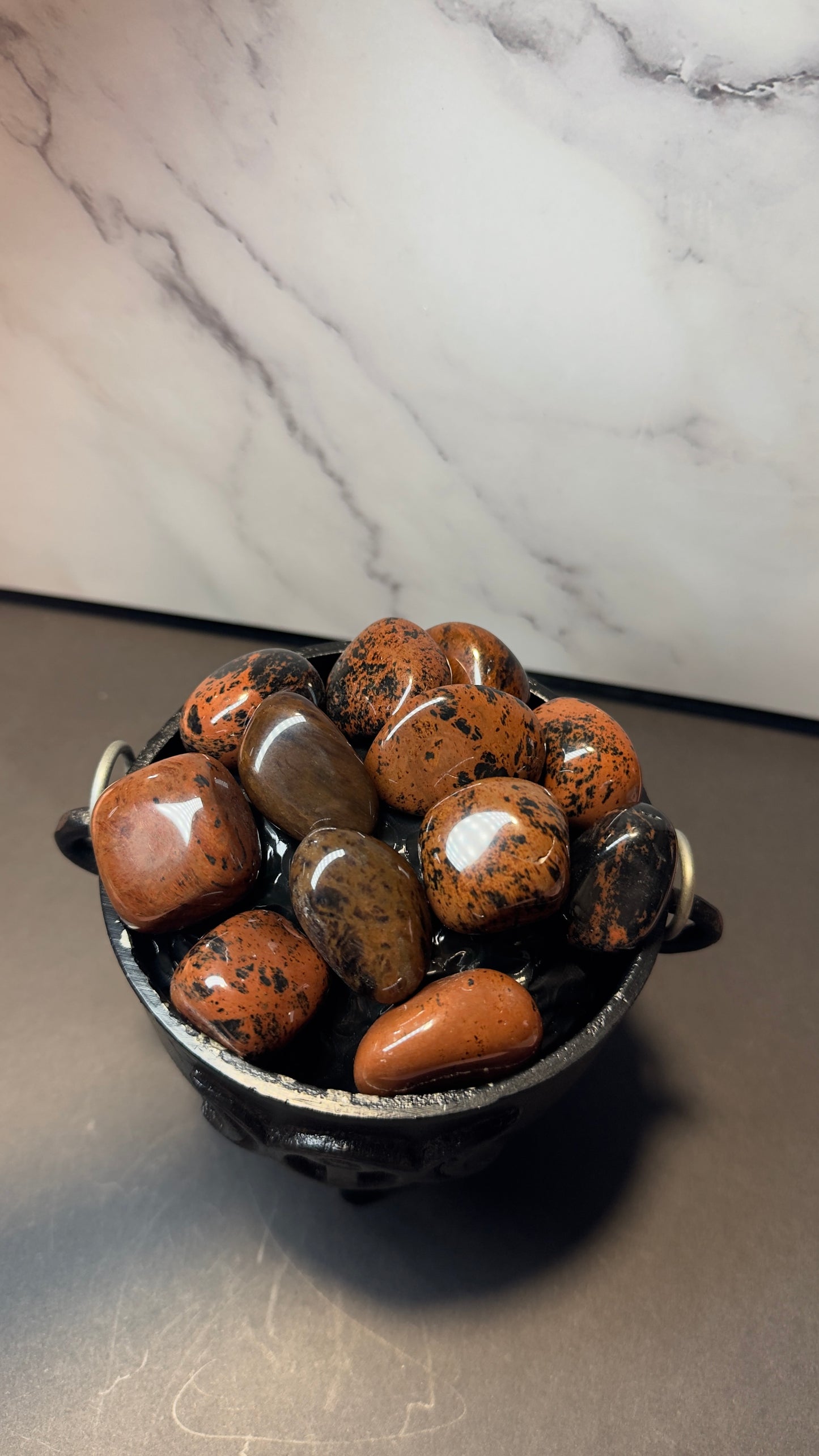 Mahogany obsidian tumbles