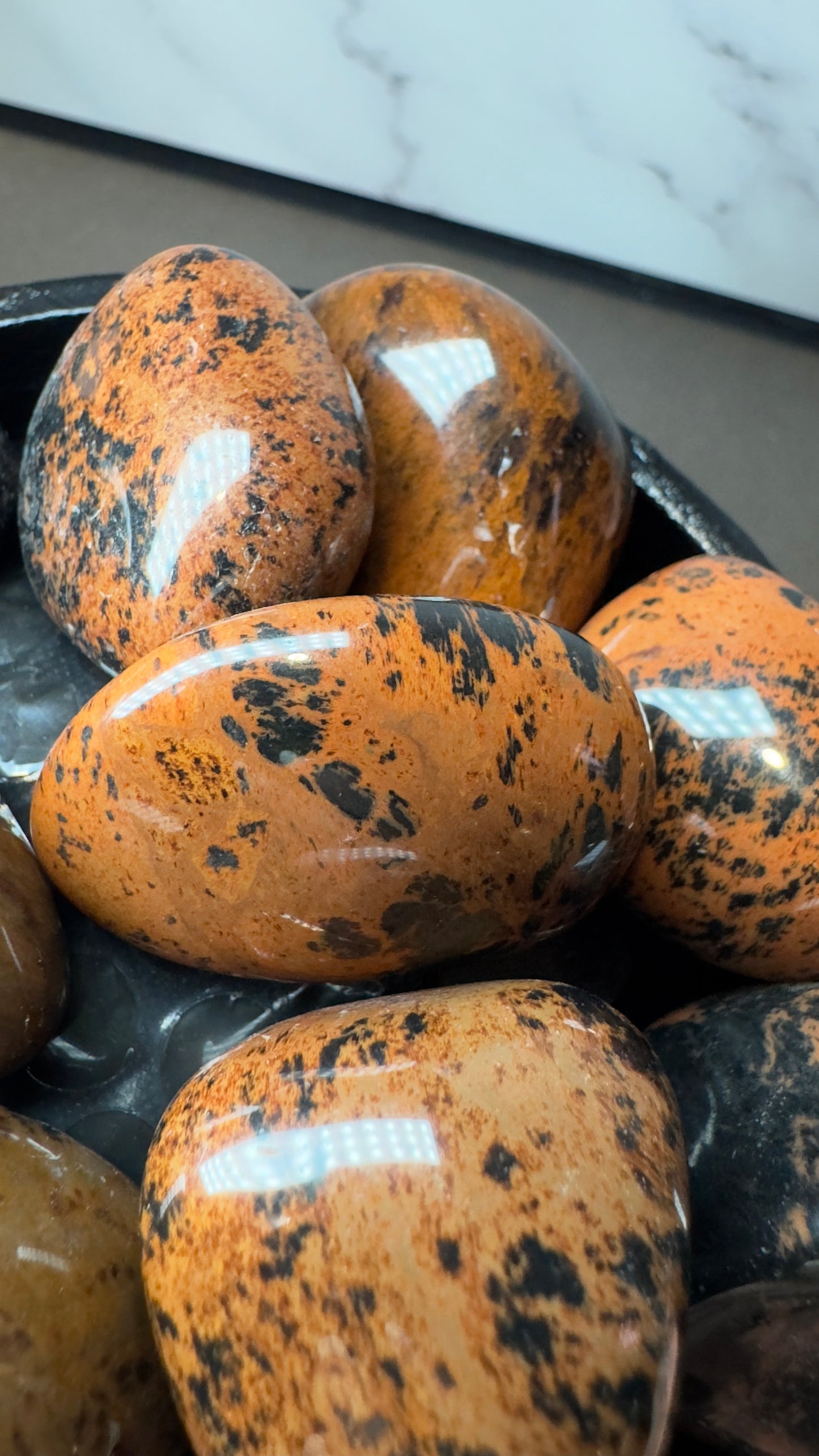 Mahogany obsidian tumbles