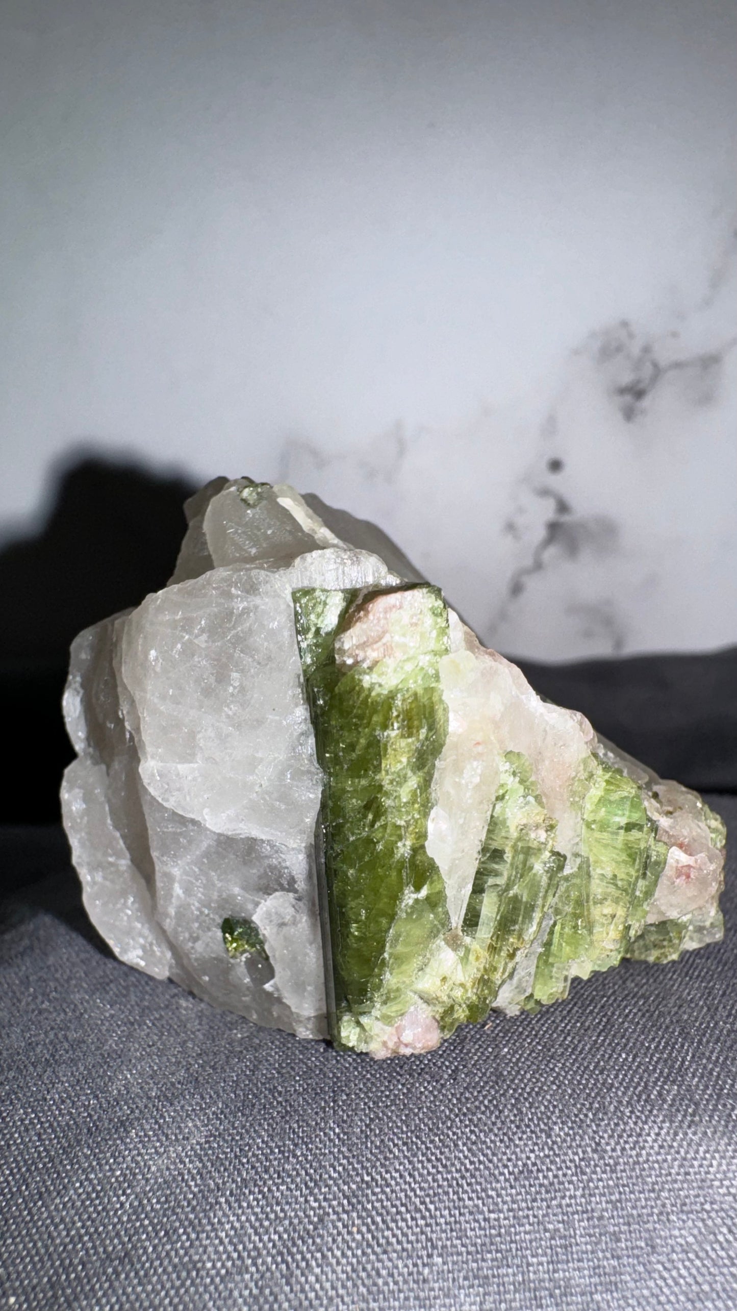 Green/pink tourmaline on quartz