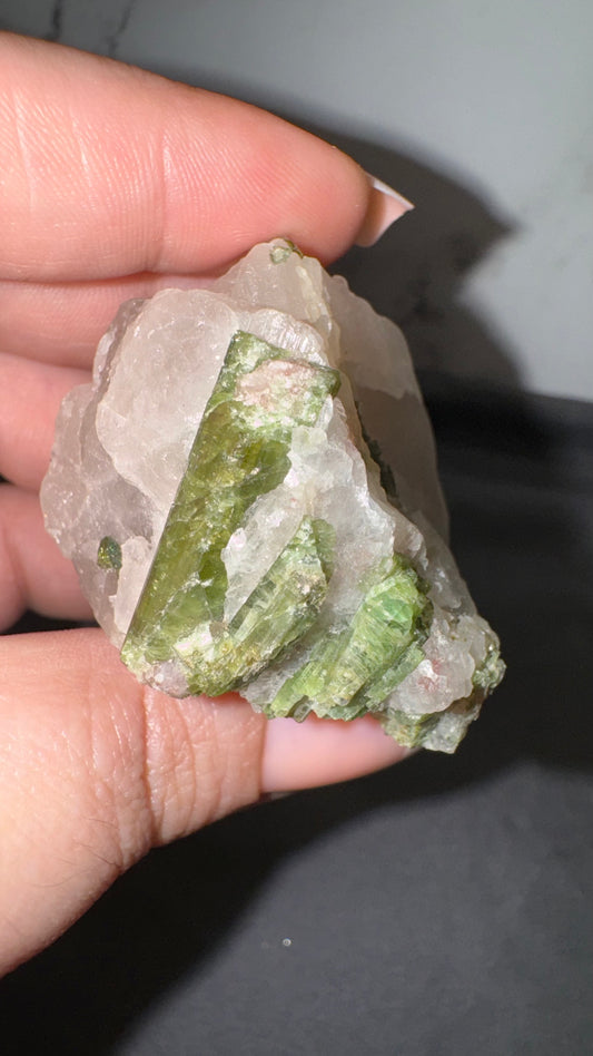 Green/pink tourmaline on quartz