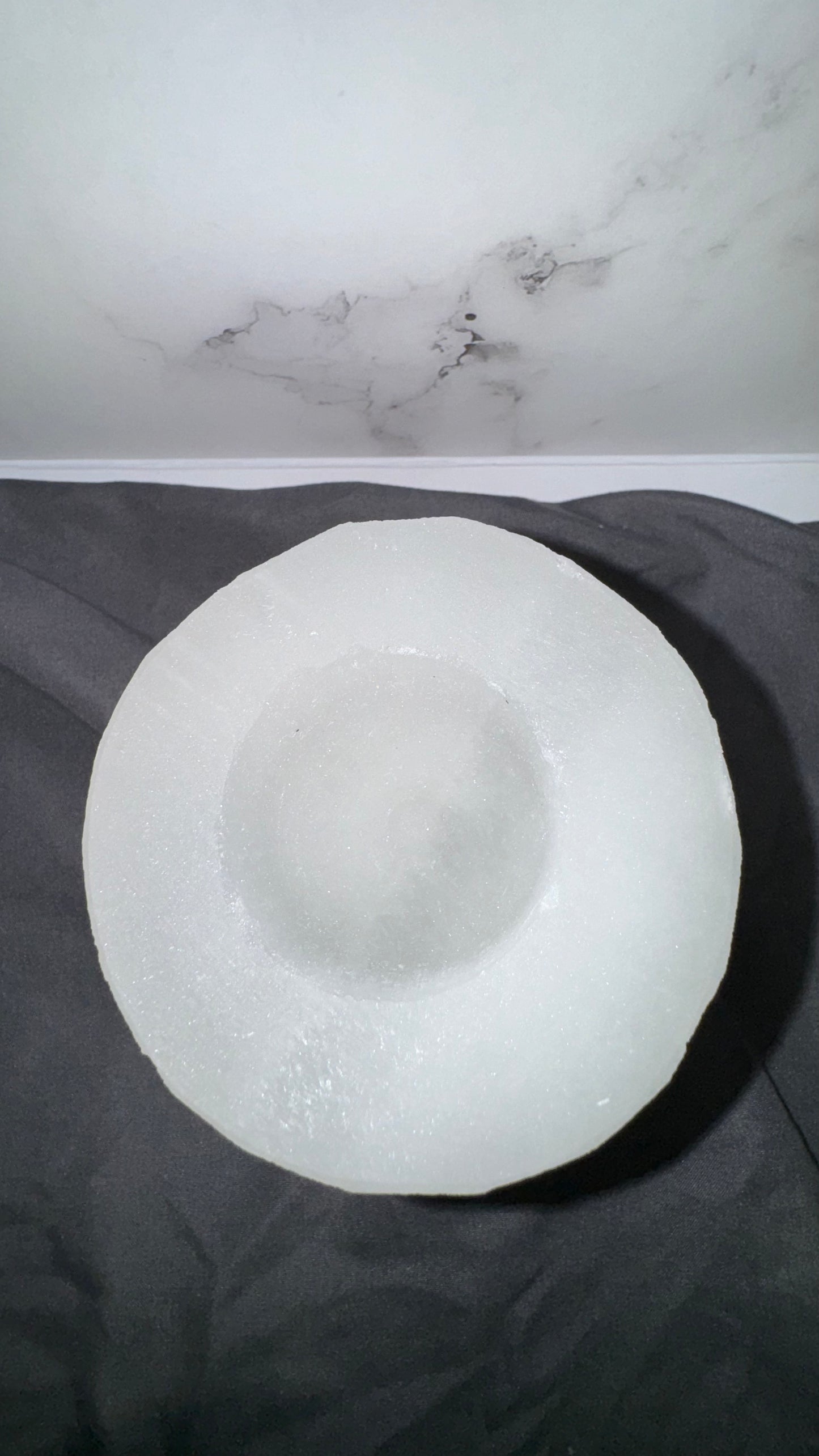 Satin spar holder