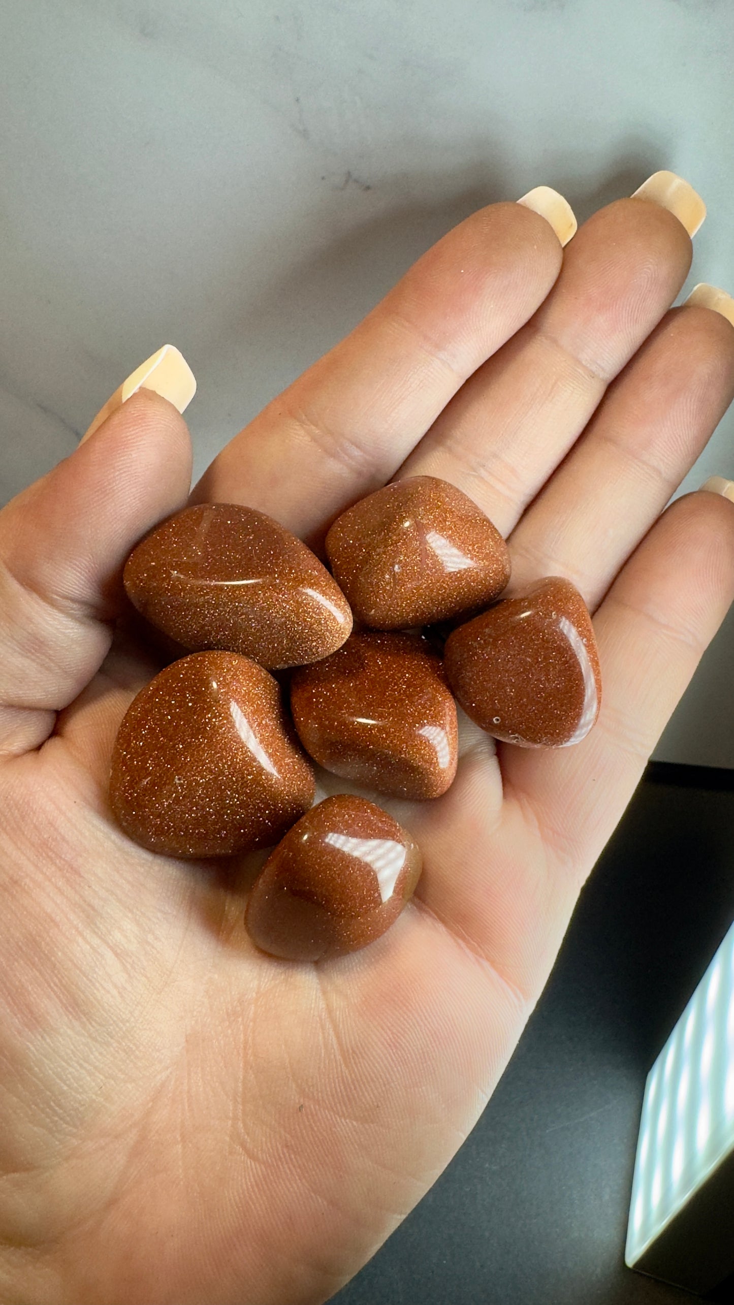 Gold sandstone tumbles