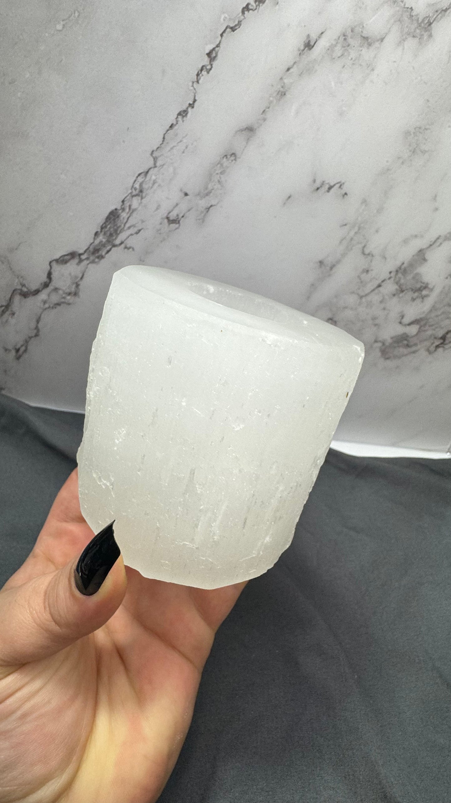 Satin spar holder