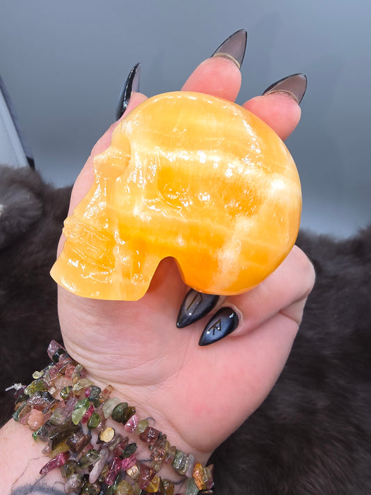 Orange calcite skull