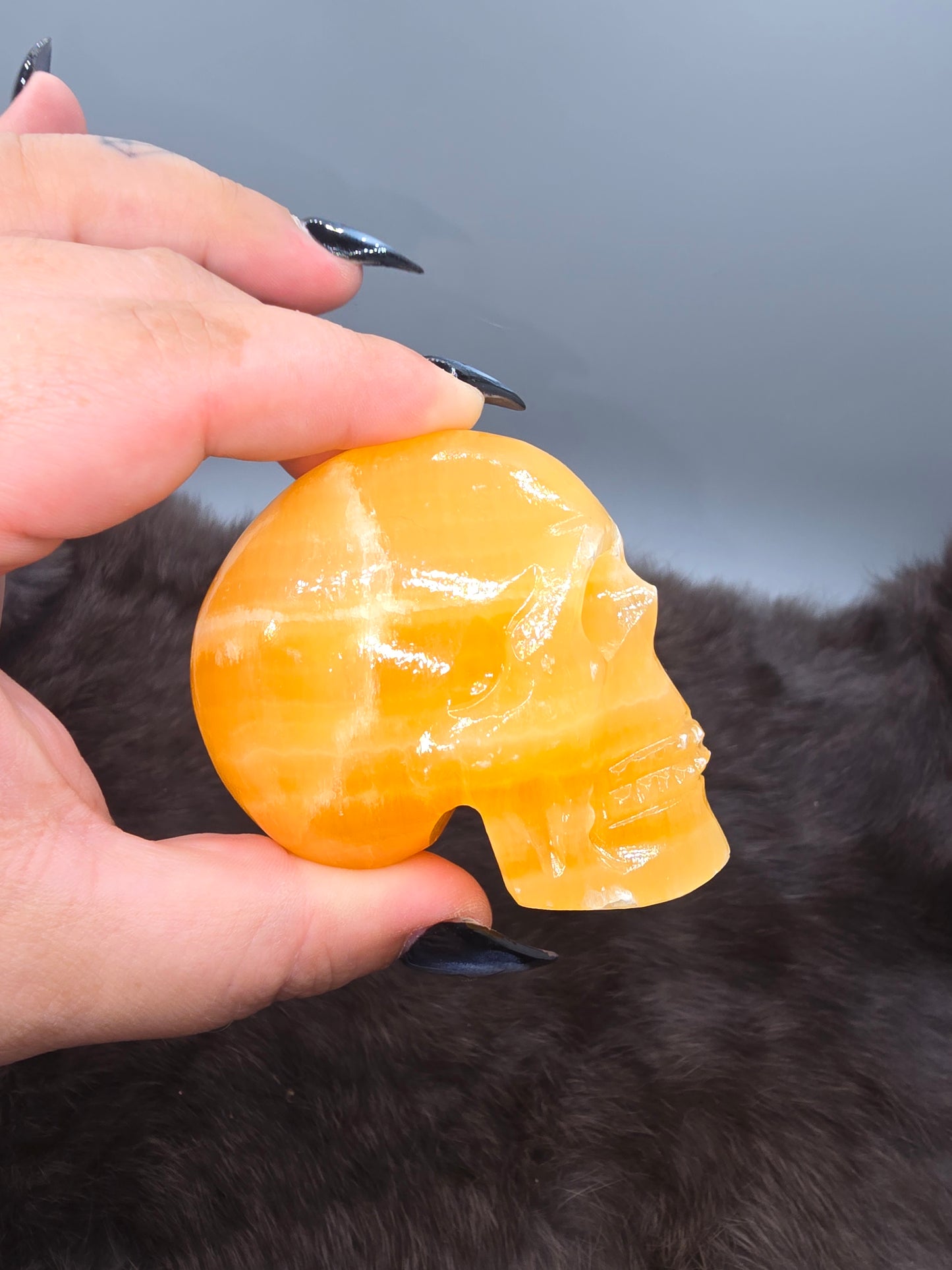 Orange calcite skull